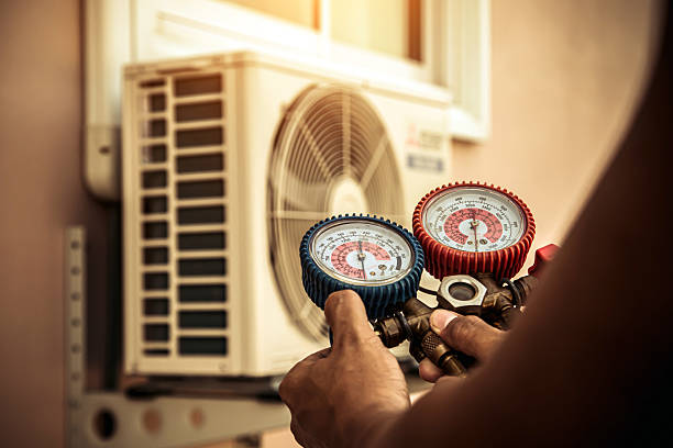 Professional Ductwork Repair technician working in Woodland, WI